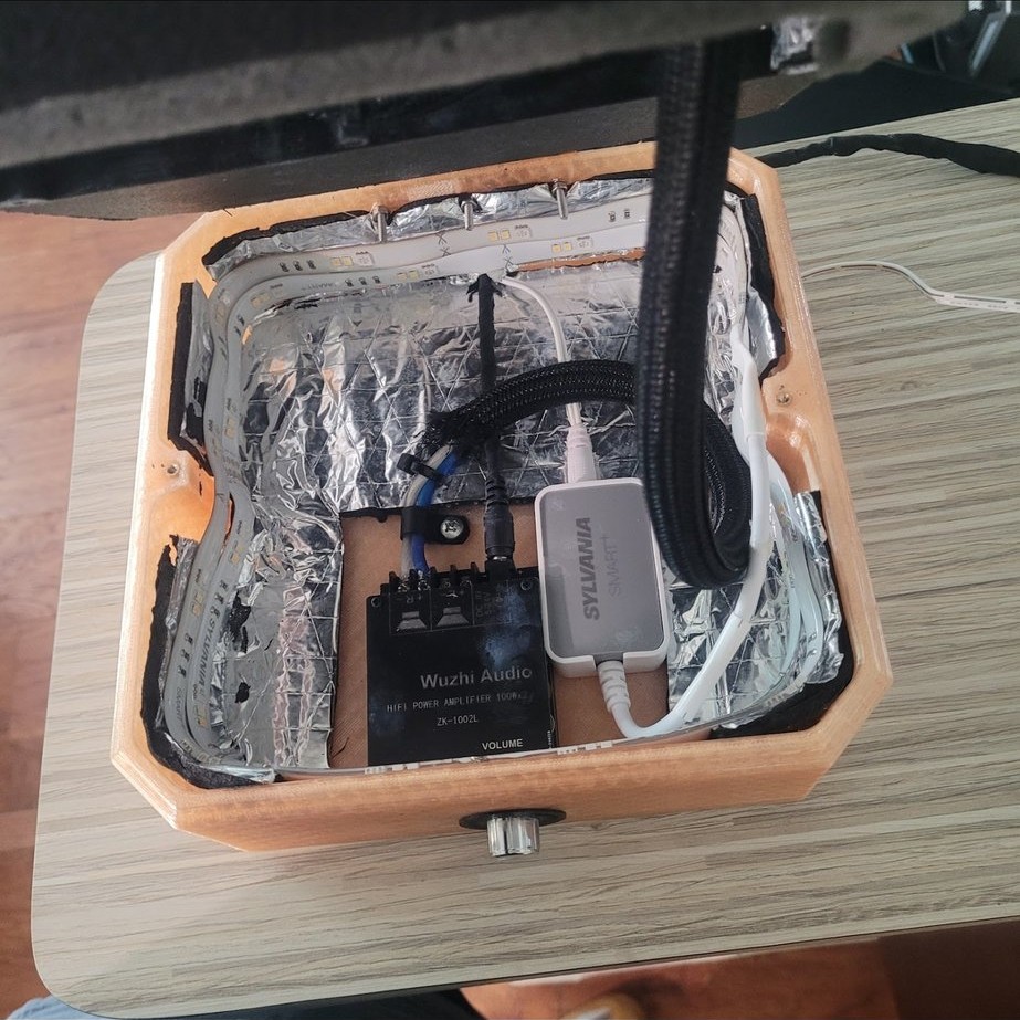 Electronics compartment showing Wuzhi amp, LED receiver, and wiring