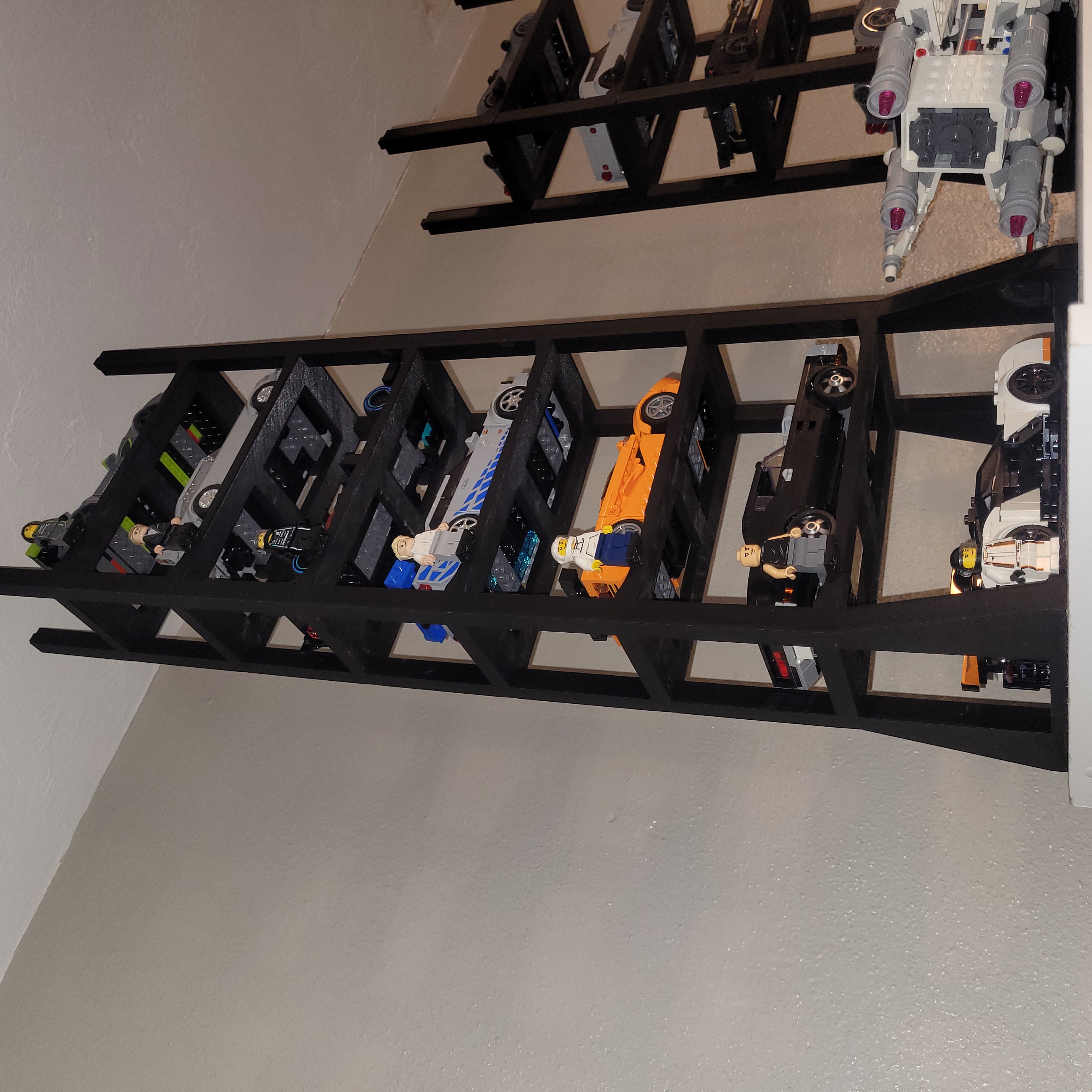 Close-up of two Speed Champions cars in stacking stand
