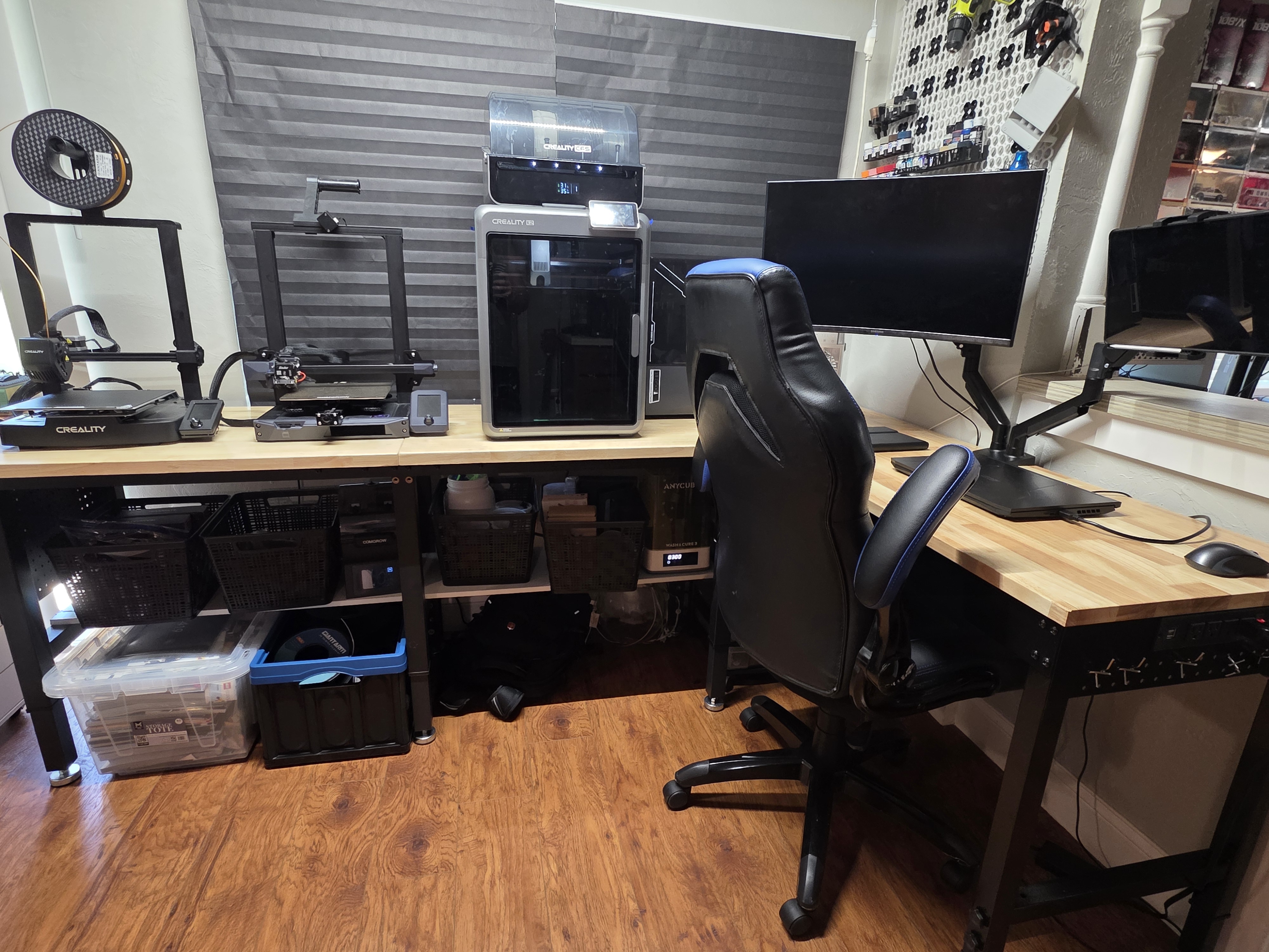 Johnny Poole's maker space with 3D printers and workbench